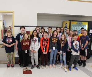 A group of students stand