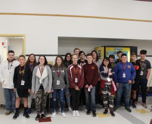 A group of students stand