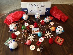 various handmade ornaments spread out on a table