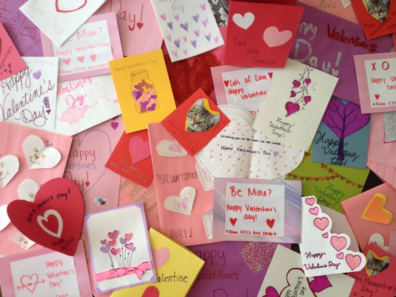 an assortment of handmade valentines on a table