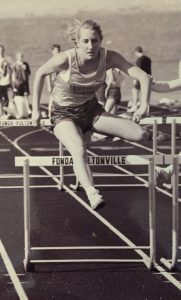 Dr. Sara (Kierpiec) Jager competing in a track and field event for FFCS.