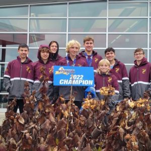 Fonda-Fultonville senior Bennett Melita, surrounded by his teammates, secured the district’s first statewide cross country title by capturing the Section II Class C cross country championship at the NYSPHSAA 2022 Boys and Girls Cross Country Championships.