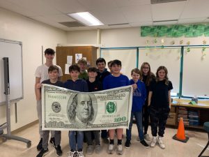 Eighth-grade students in Mr. Vunk's class are learning about the value of budgeting in their day-to-day lifestyle.