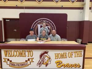 FFHS senior Emma Crahan (center) prior to signing her NIL to attend St. Rose for Softball, Track & Field. She's joined by her parents Evan and Sharon and sister Keira.