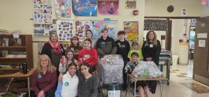 FFCSD Recycling Team: Pictured: front: Chavetliz Garcia and Jaylee VanSlyke. Second row: Mrs. Lott, Alyssa Lott, Gianna Santos, Brayden Cooper. Third row: St. Mary's Case Manager Carmen Rodriguez, Natalia Mauro, Sidney Carpenter, Victor Eckler, Sam Huckans, Tyler Miller and St. Mary's Program Manager Suzanne Hagadorn.