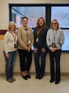 For the first time in school history, the district secured placement into a New York State United Teachers (NYSUT) program that strengthens mentoring and building-level experience for teaching assistants and classroom aides. From left to right: FFCSD staff members: Lisa Harbison, Kayla Dufel, Tracy Miller and Sandra Cimmino.