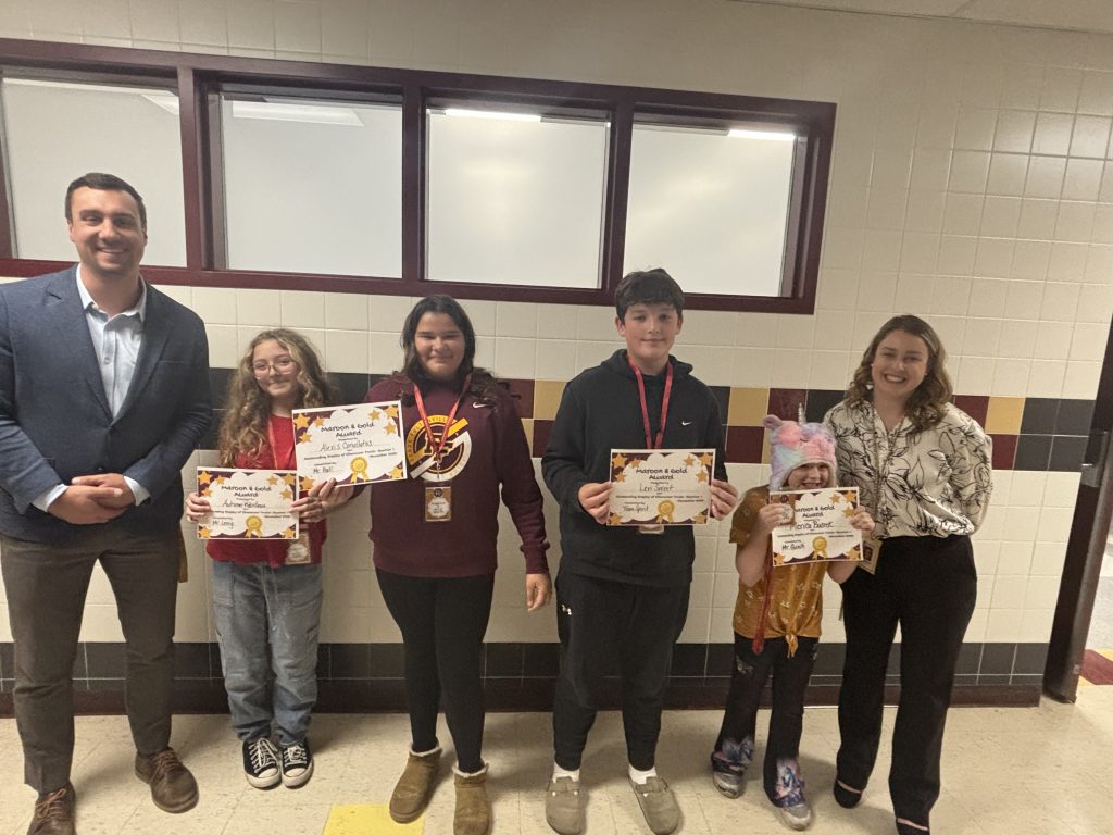 Seventh-grade Character Education recipients: Lillian Buanno, Alexis Canallatos, Autumn Robideau, and Levi Sweet.