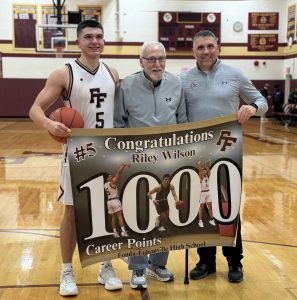 On December 12, Fonda-Fultonville senior Riley Wilson reached the 1,000-point milestone in his varsity basketball career. Riley’s recent accomplishment put him in the same rare air as his grandfather and father, who each achieved the 1,000-point milestone in their respective high school careers.