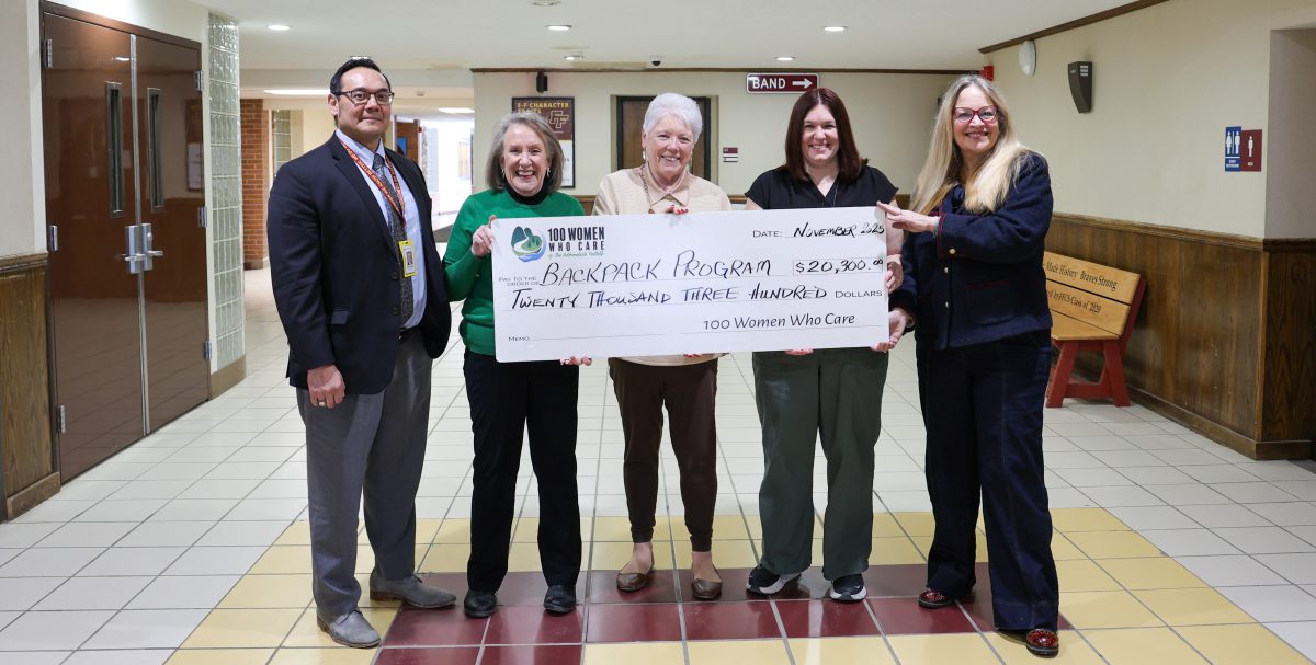 100 Women Who Care deliver check to FFCSD